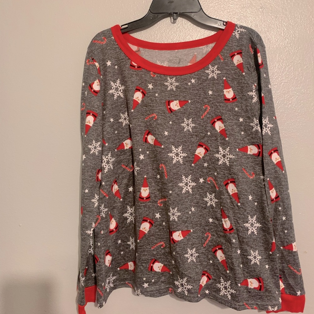 This is a kids, Christmas pajama shirt, size large, but fits medium